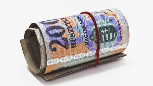 Image: 0098476819, License: Rights managed, Restrictions: ::::::::::::::, Viele ungarische Forint Geldscheine zusammengerollt und mit einem Gummi zusammengehalten | many hungarian forint banknotes rolled up and held together with a rubber, Property Releas