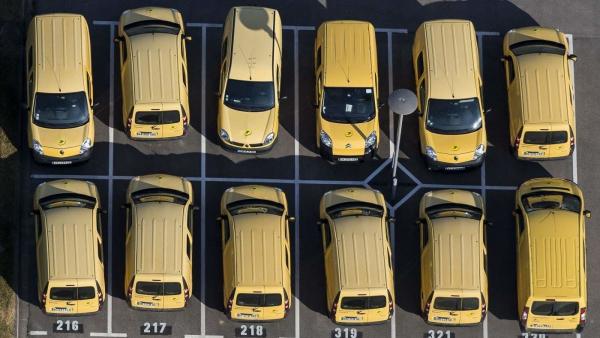 France, Ile-de-France, Berne-sur-Oise, post services cars lined up on a car park